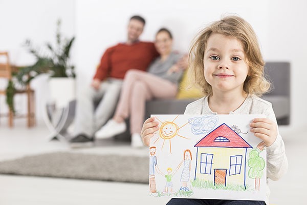 Child Custody Relocation - Child with crayon picture of their home - Family Law Attorney helps with parenting plan